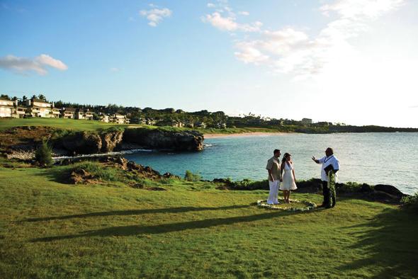 Bridal Couple with Celebrant by cliff